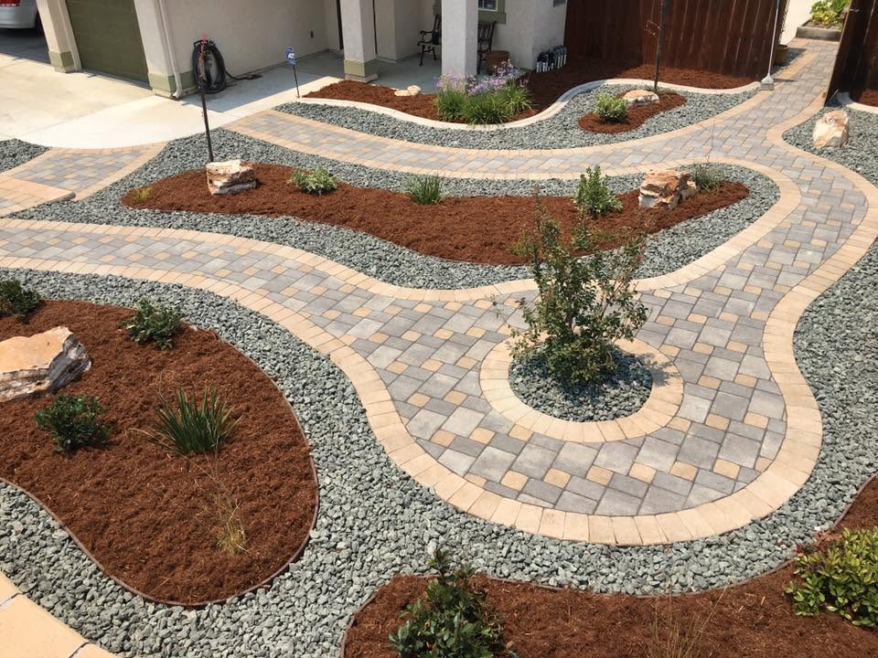 Curved paver driveway with mulch islands, Grover Beach
