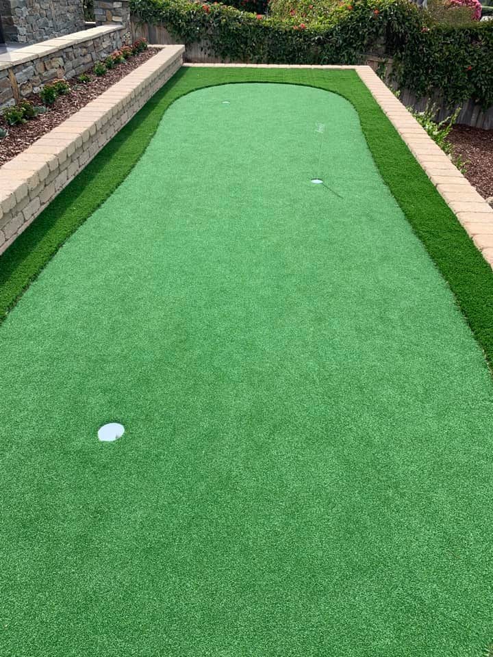 Putting green with stone edging
